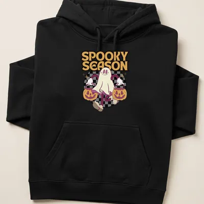 Cartoon ghost holding pumpkin buckets with the text Spooky Season in colorful design. — printed on a unisex hoodie