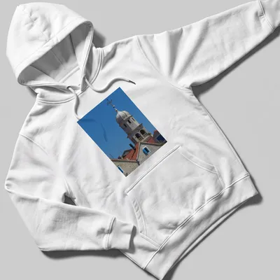 Photographic print of St Helen's Church Tower with blue sky and architectural details — printed on a unisex hoodie