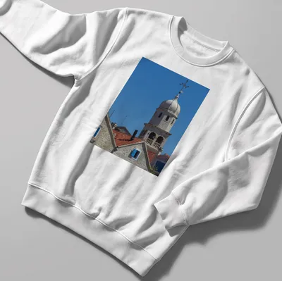 Photographic print of St Helen's Church Tower with blue sky and architectural details — printed on a unisex sweatshirt