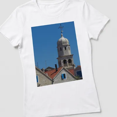 Photographic print of St Helen's Church Tower with blue sky and architectural details — printed on a women's shirt