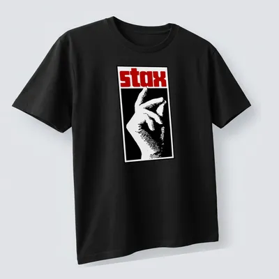 Bold graphic t-shirt featuring the word 'stax' and a hand gesture in black, white, and red. — printed on a unisex t-shirt (angled view)