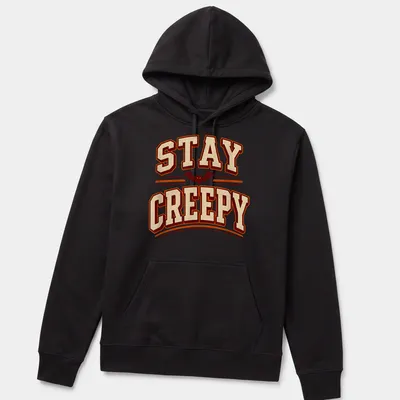 Vintage Halloween tee with a playful bat design and text 'STAY CREEPY' — printed on a unisex hoodie