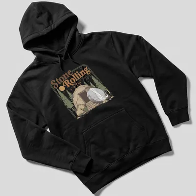 Vintage illustration of an empty tomb with a rolled stone and crosses, featuring the text Stone Rolling Since AD 33 — printed on a unisex hoodie