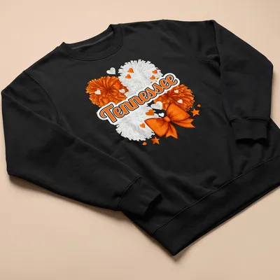 Illustration of an orange bow and pom-poms with Tennessee text — printed on a unisex sweatshirt
