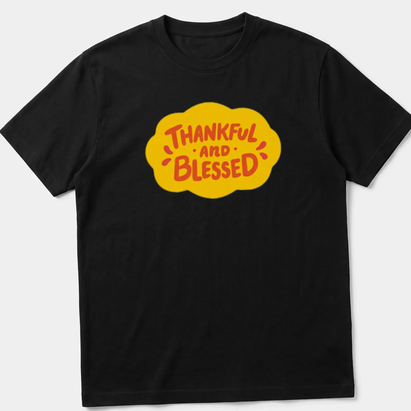 Playful cartoon design featuring a cloud and the words Thankful and Blessed — printed on a unisex t-shirt