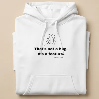 Simple line-art beetle with text 'That's not a bug. It's a feature.' — printed on a unisex hoodie
