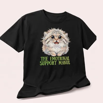 Watercolor illustration of a cute Pallas cat with emotional support text — printed on a unisex t-shirt (angled view)