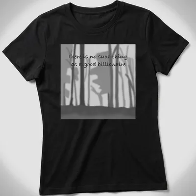 Minimalist shirt with black, gray, and white abstract forest silhouettes and bold text. — printed on a women's shirt