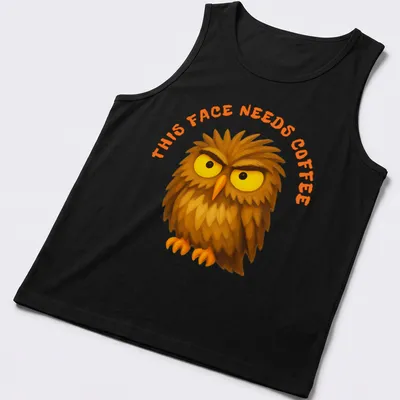 Cartoon grumpy owl with text 'This Face Needs Coffee' in brown, yellow, and orange — printed on a tank top