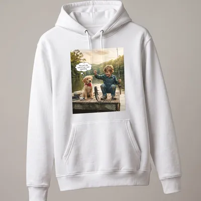 Photographic t-shirt featuring a golden retriever puppy and child fishing together — printed on a unisex hoodie