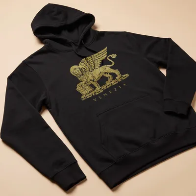 Distressed gold winged lion emblem with Venezia text printed in white — printed on a unisex hoodie