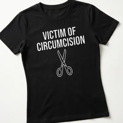 Bold text 'Victim Of Circumcision' with scissors graphic in white. — printed on a women's shirt