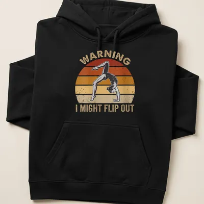 Retro gymnastics tee with a girl flipping and humorous warning text — printed on a unisex hoodie