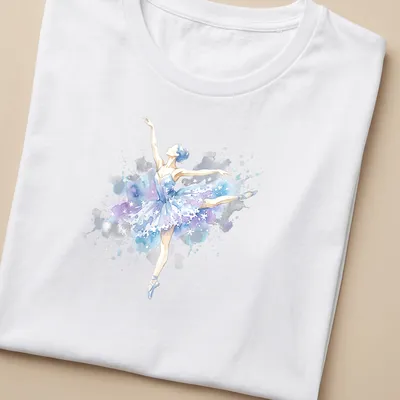 Watercolor print of a ballerina dancing in snowflakes, featuring blue, purple, white, and gray. — printed on a women's shirt