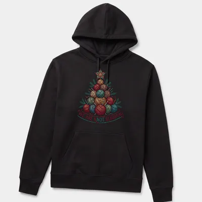 Illustrated yarn Christmas tree with the text 'We Are Knot Behaving' in festive colors — printed on a unisex hoodie