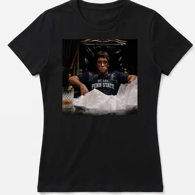 Dramatic illustration of Scarface with WE ARE PENN STATE text in black, white, and gold — printed on a women's shirt