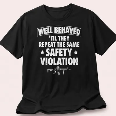 Bold text reading WELL BEHAVED with rifle graphic on a black — printed on a unisex t-shirt