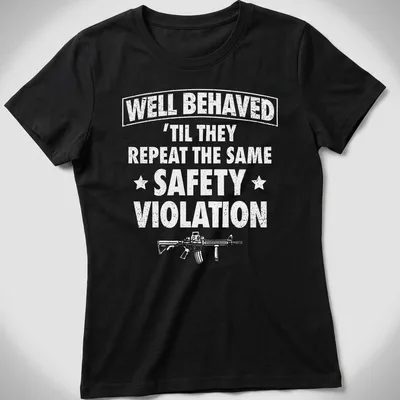 Bold text reading WELL BEHAVED with rifle graphic on a black — printed on a women's shirt