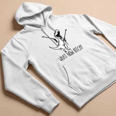 Cartoon T-Rex with bold text 'WHAT NOW BITCH?' in black and white — printed on a unisex hoodie