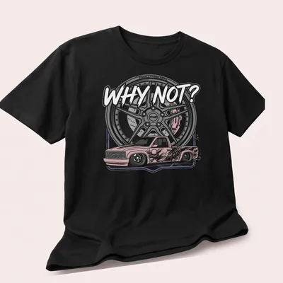 Illustration of a slammed truck with custom wheels and the text 'WHY NOT?' — printed on a unisex t-shirt (angled view)