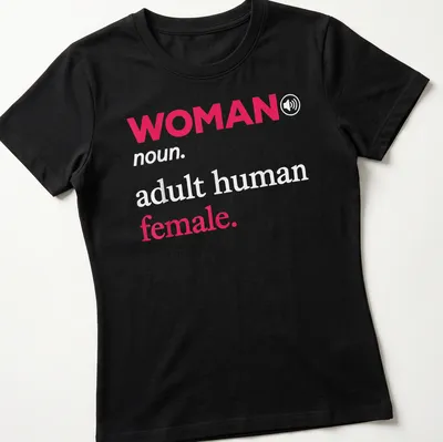 Modern typography t-shirt with the text 'WOMAN noun. adult human female.' in pink and white. — printed on a women's shirt