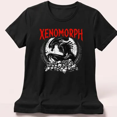 Dark gothic Xenomorph skull graphic in black, red, and white — printed on a women's shirt
