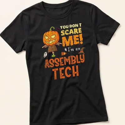 Funny Halloween shirt with cartoon pumpkin scarecrow and playful text — printed on a women's shirt