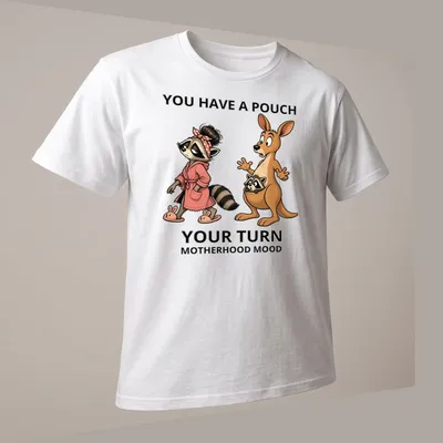 Whimsical cartoon kangaroo and raccoon with humorous text about motherhood. — printed on a unisex t-shirt (angled view)
