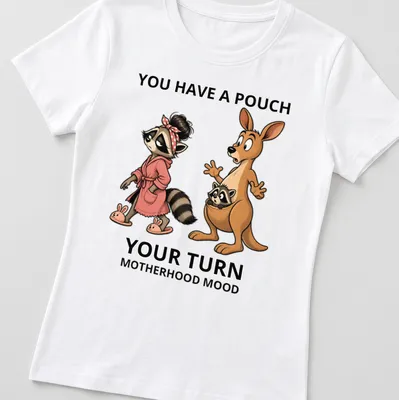 Whimsical cartoon kangaroo and raccoon with humorous text about motherhood. — printed on a women's shirt
